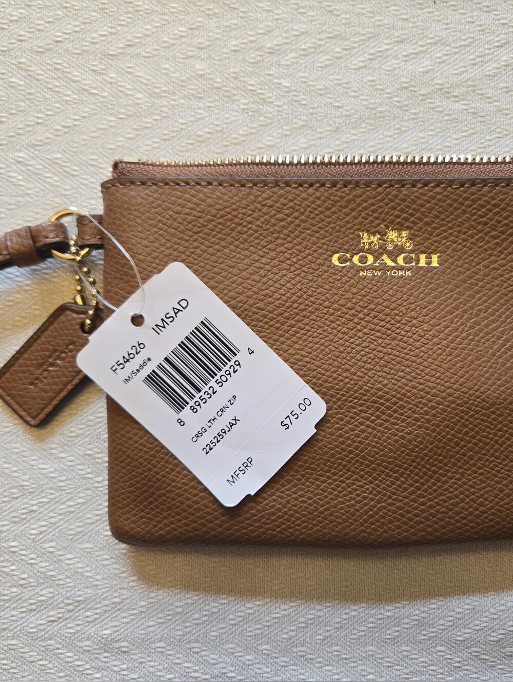 Coach New York Tan Pebbled Leather Wristlet with Gold Logo